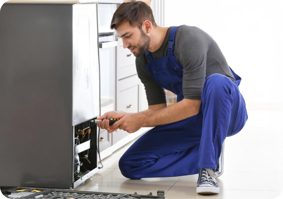 technician unscrewing hvac unit
