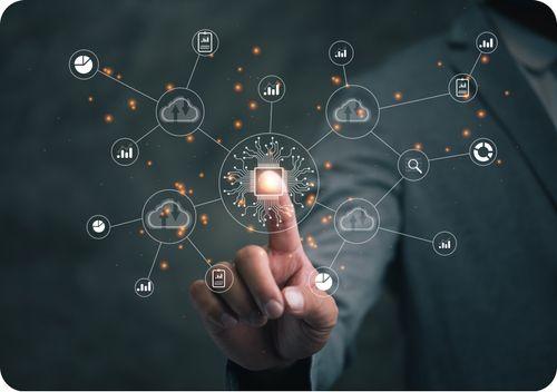 finger pointing to a circle that looks like a lit up computer chip