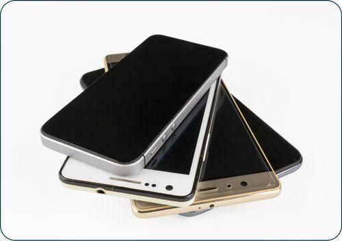 photo of four phones stacked